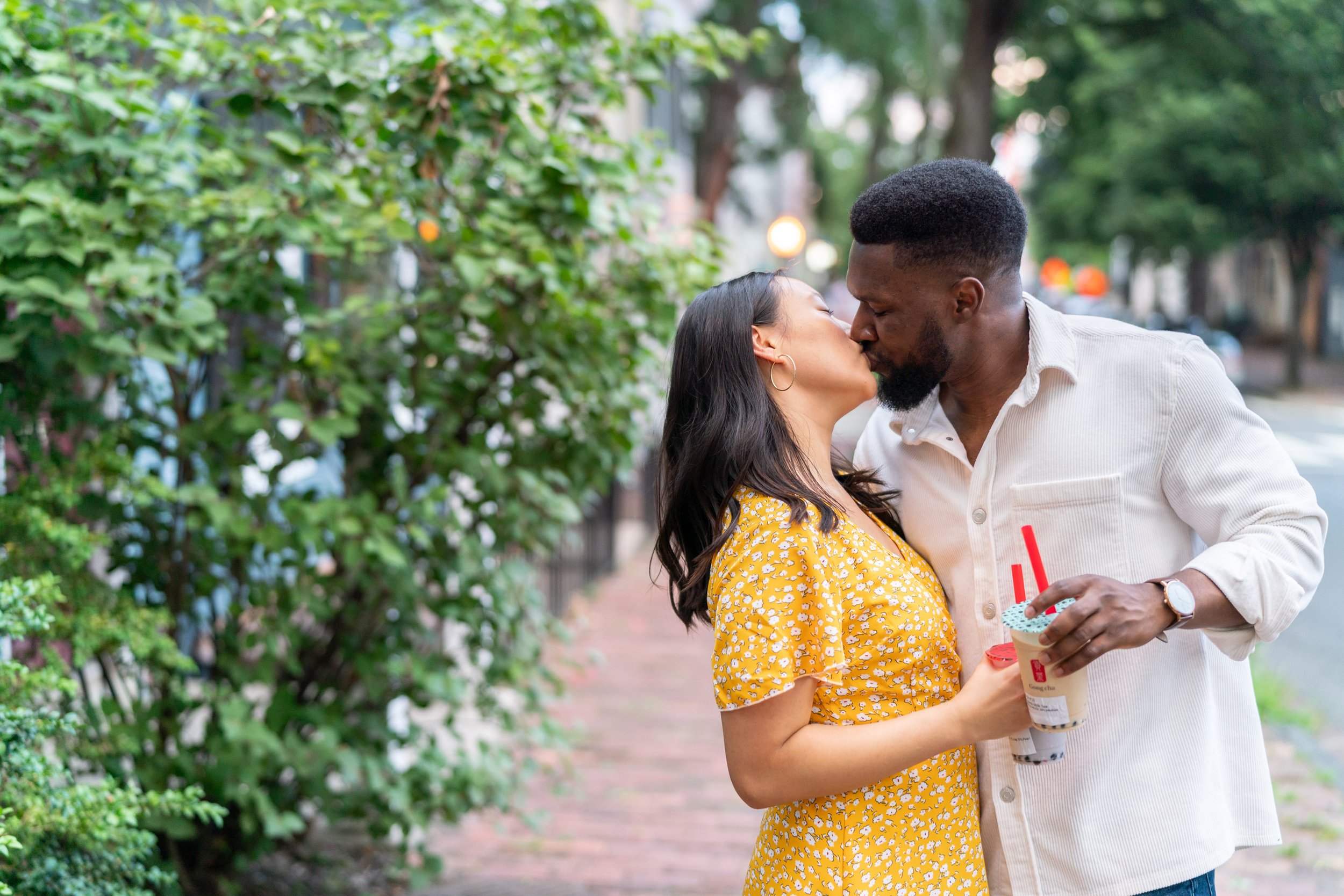 Bride and groom get boba at dc Georgetown engagement session