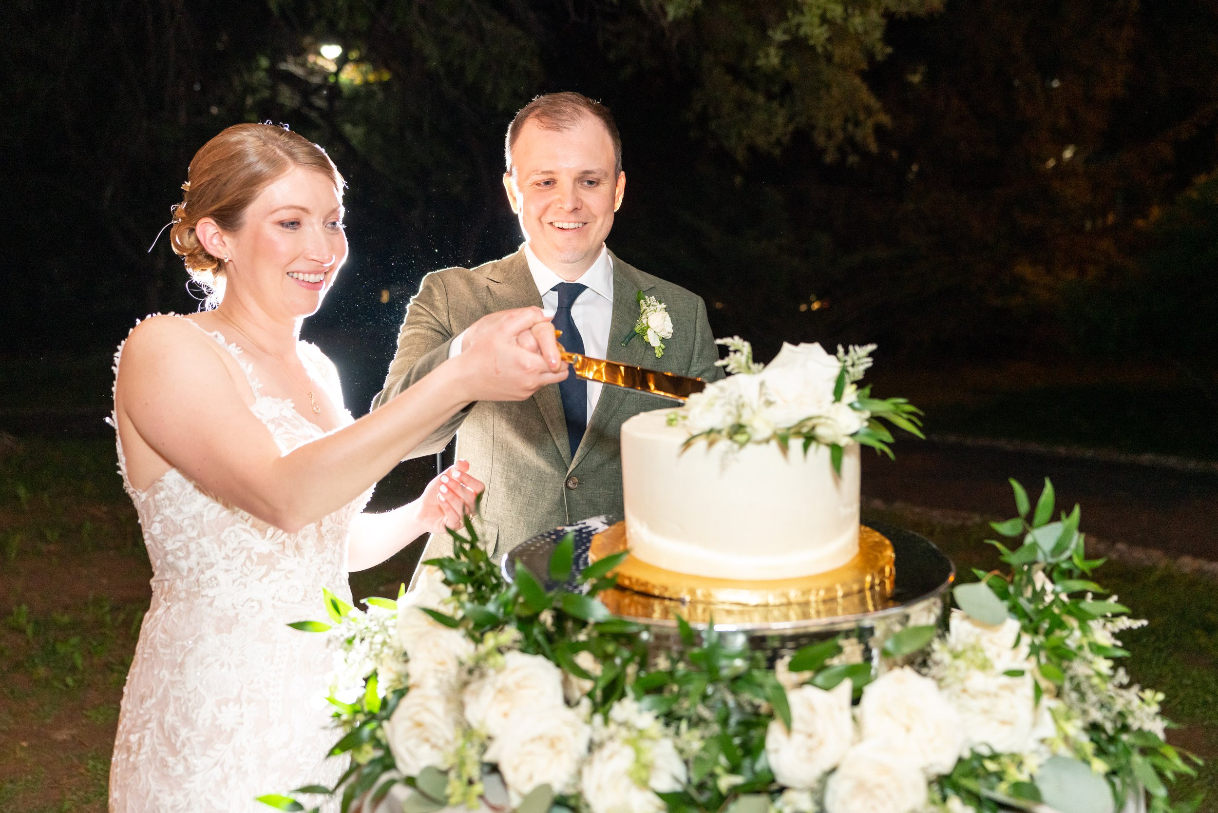 cake cutting direct flash wedding photography at Lincoln's Cottage