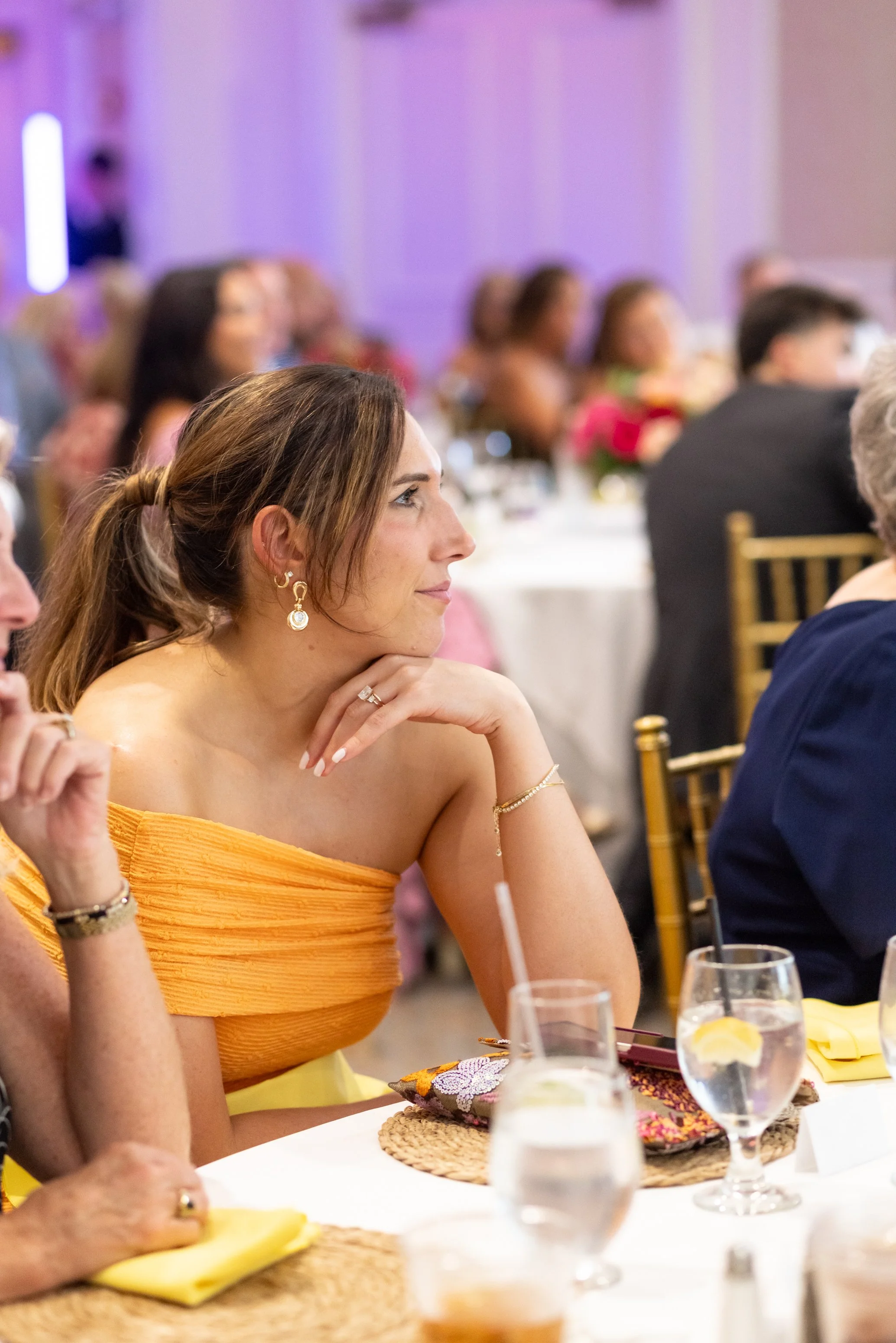 wedding guest listening to speech candid colorful wedding photography in dc