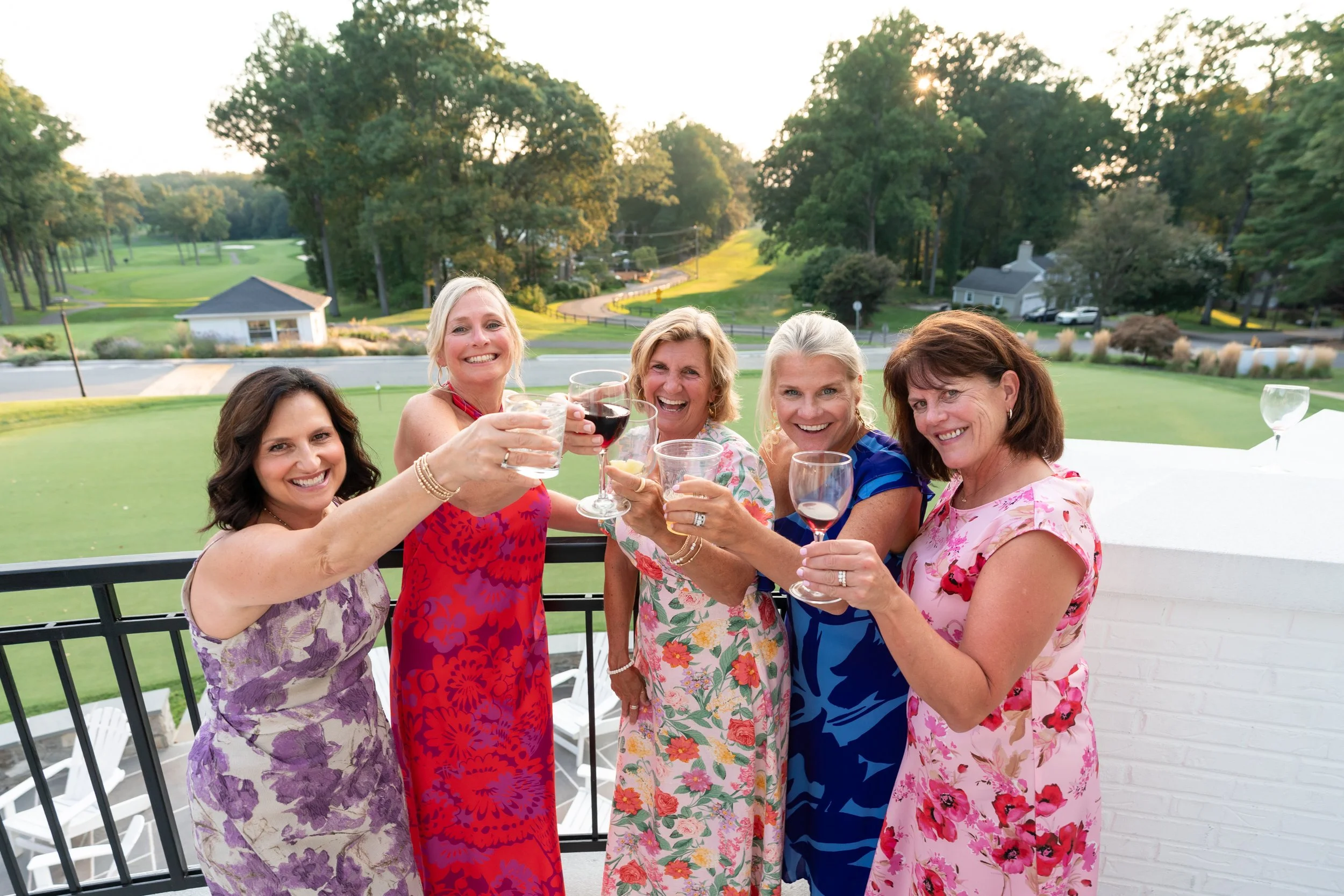 Women having fun at wedding in Rockville md candid and colorful sunset
