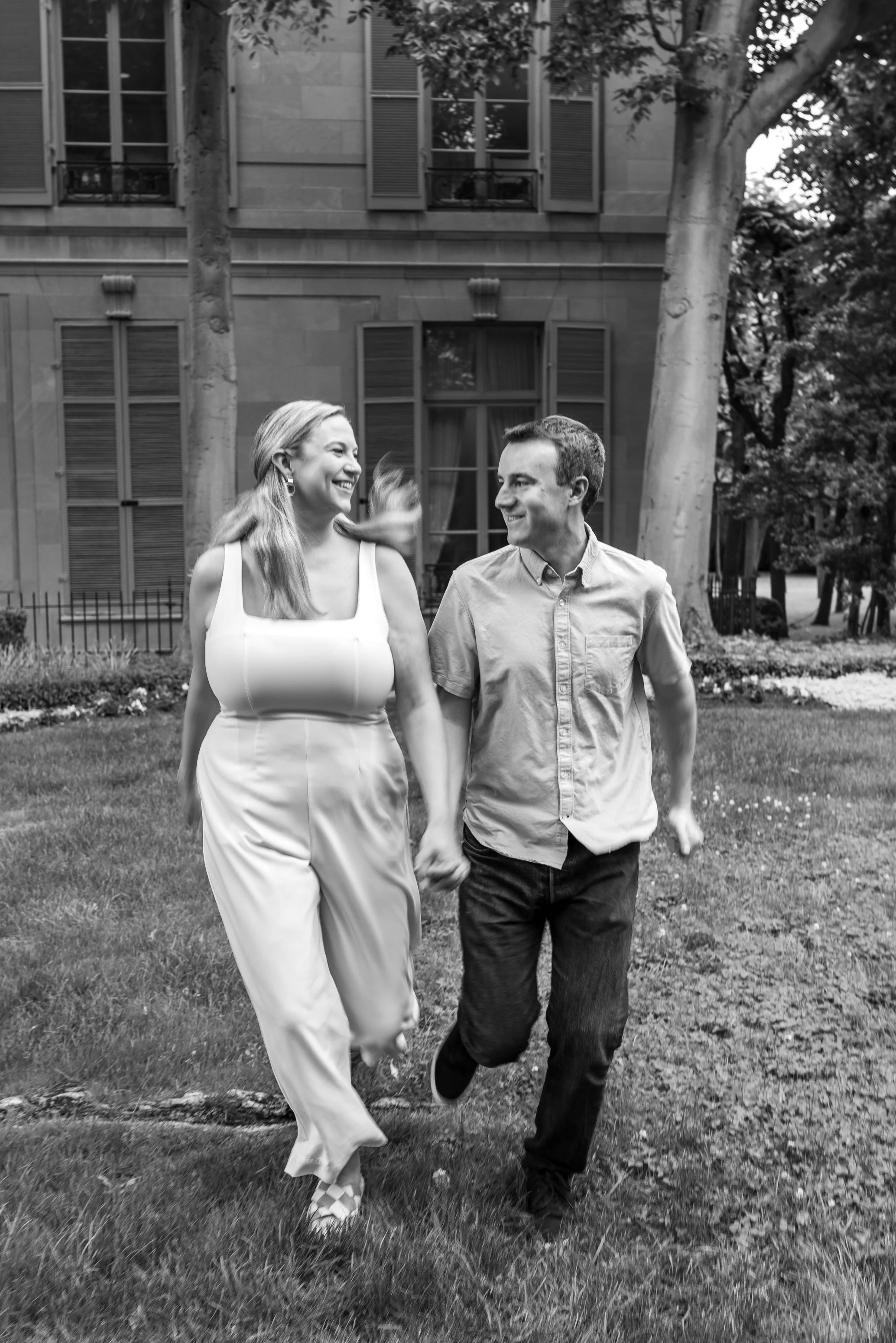Couple jogging running in garden at meridian house in Washington dc