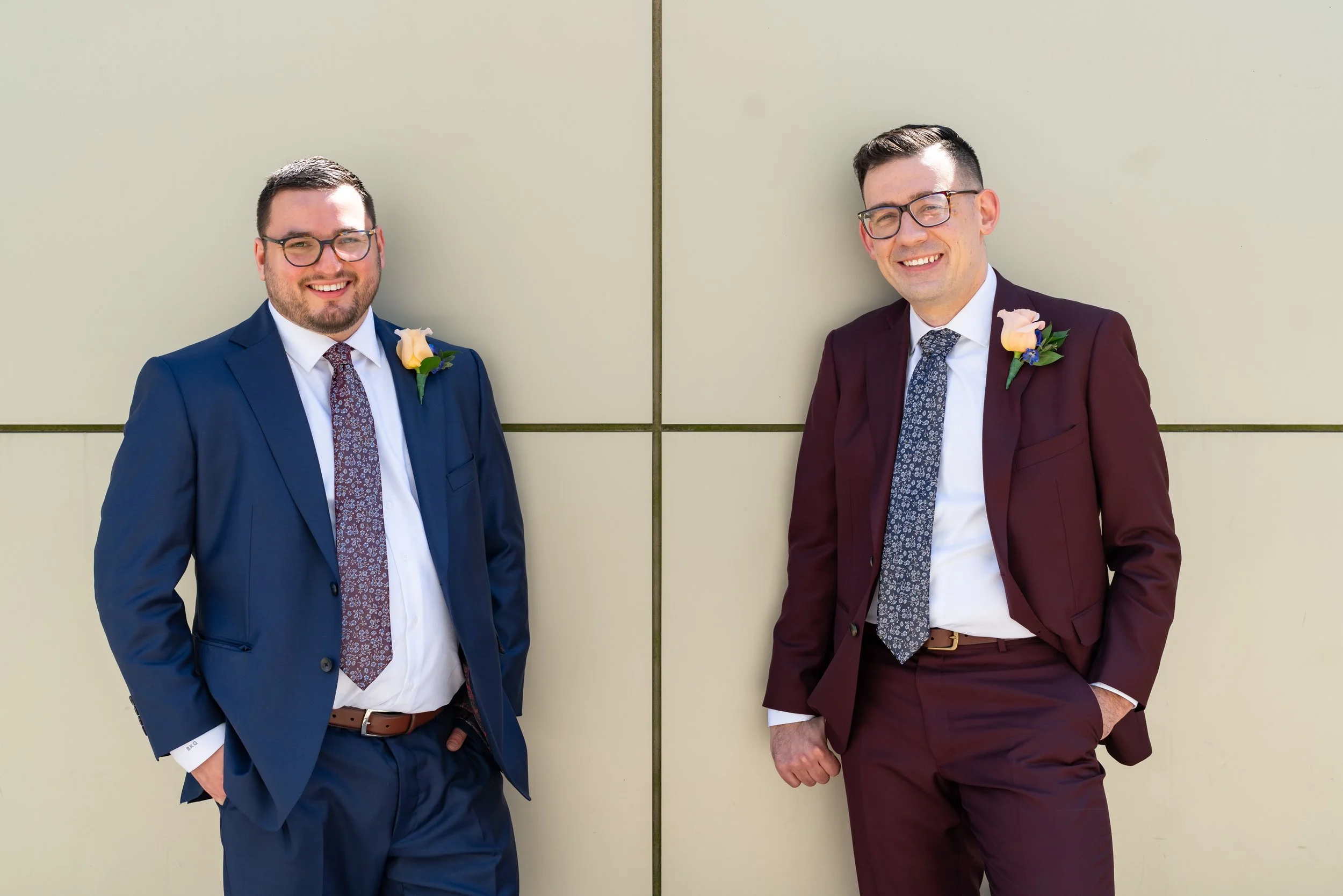 Grooms in navy and burgundy suit portraits on wedding day gay wedding Washington dc
