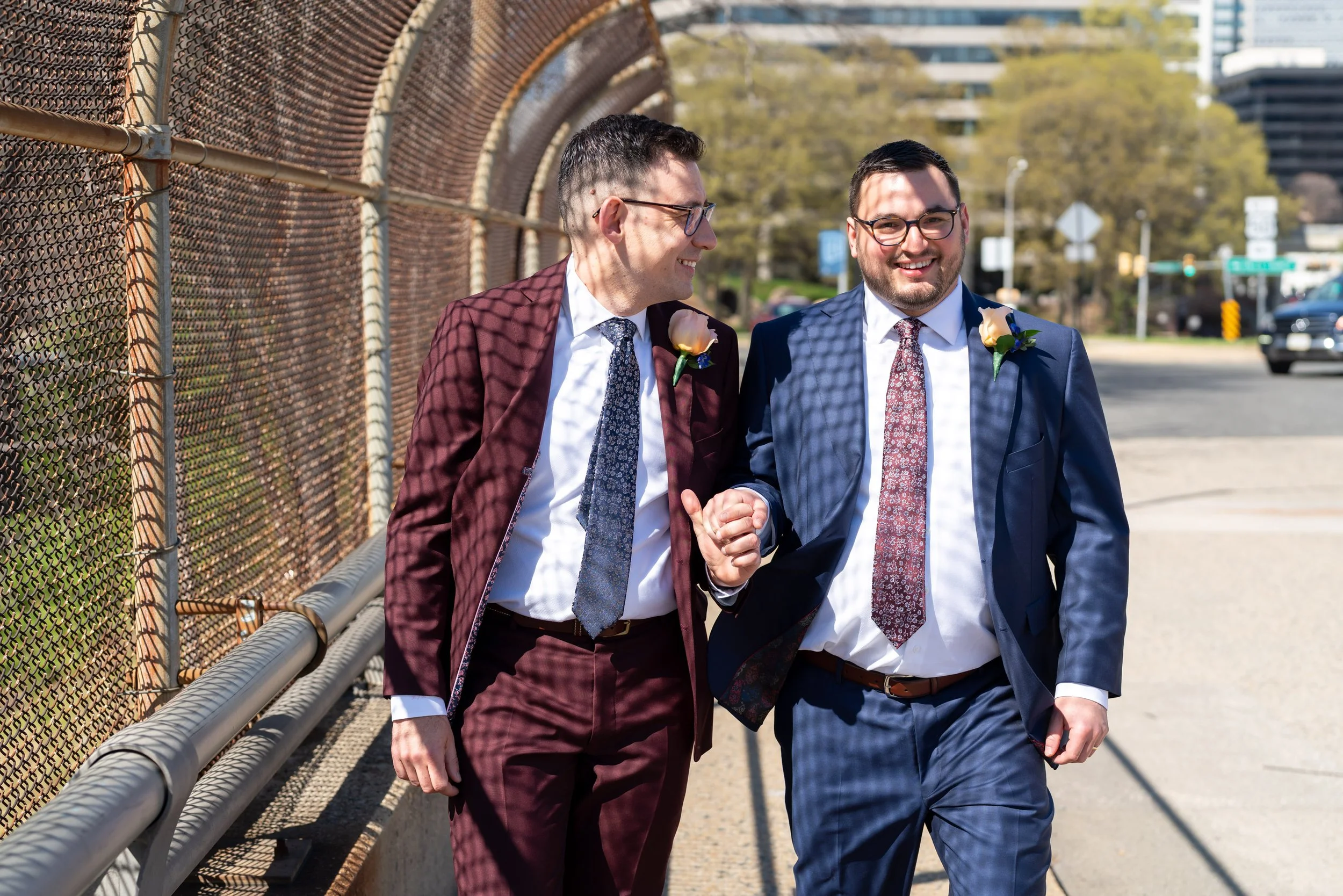 Grooms in navy and burgundy suit portraits on wedding day gay wedding Washington dc
