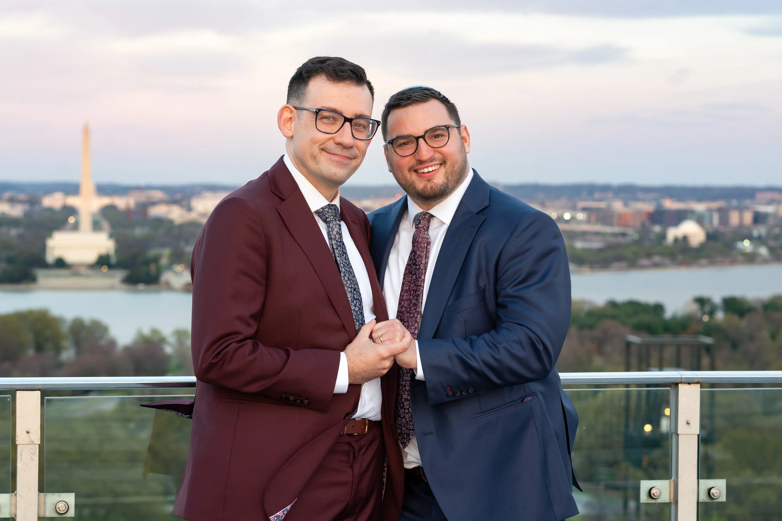 Gay wedding sunset colorful candid photos at Top of the Town venue with DC views