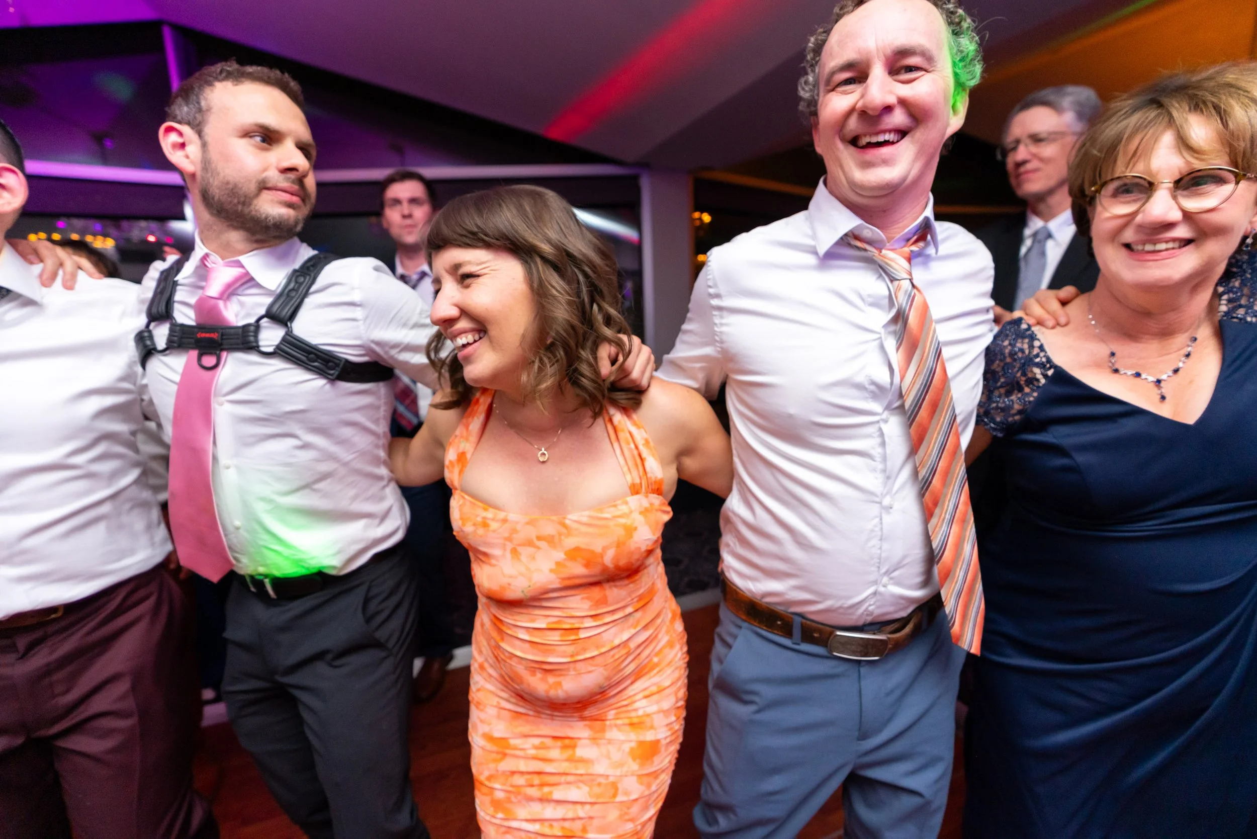 Fun colorful candid wedding photographer in Washington DC at Top of the Town wedding