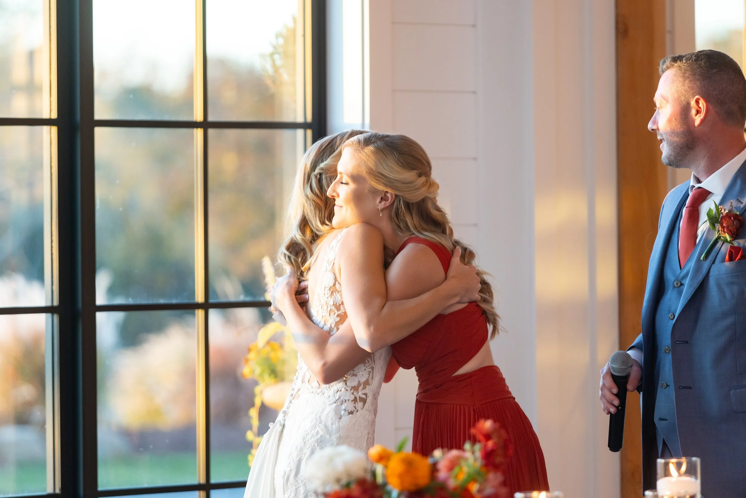 Beautiful bright colorful wedding photograph of the toasts and speeches at Hilltop Farm