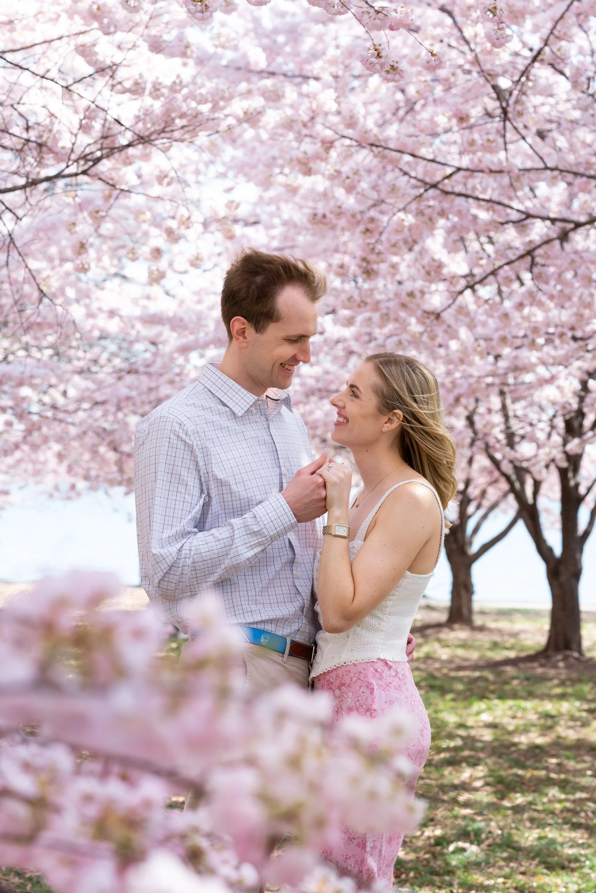 Amazing pink cherry blossom engagement photos and session in dc and fort mchenry