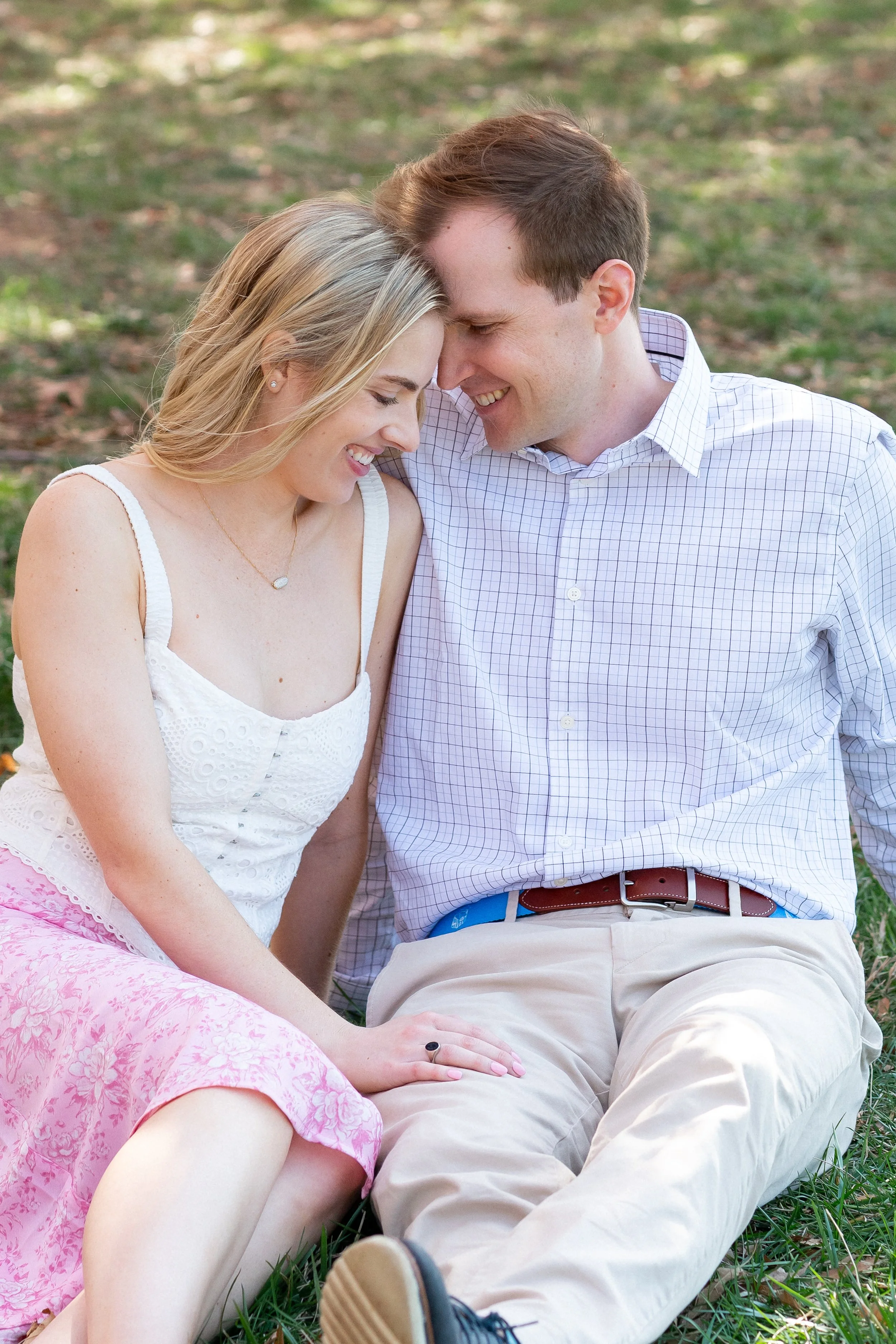 Fort McHenry pink cherry blossom engagement sessions in spring