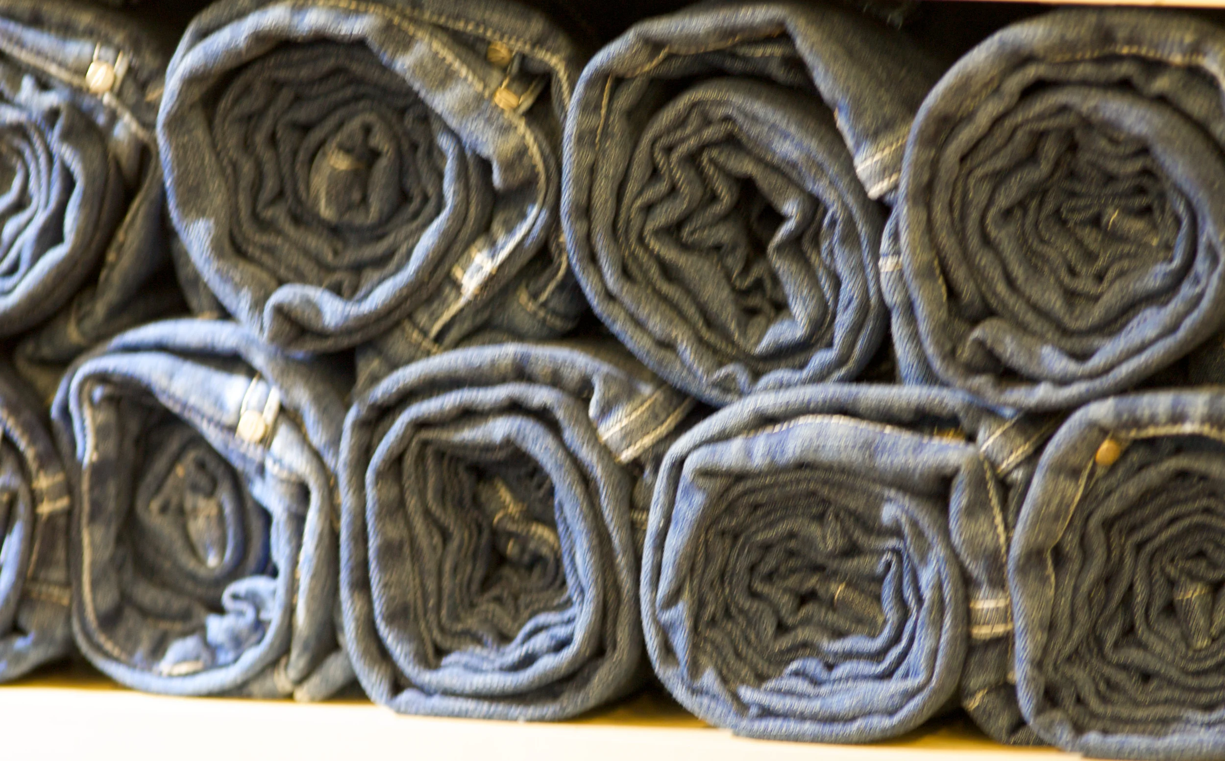 Stretch Denim Jeans Rolled On Display