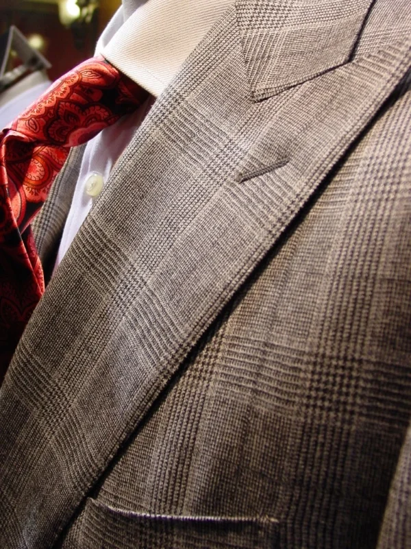 The peak lapel of a double breasted suit.