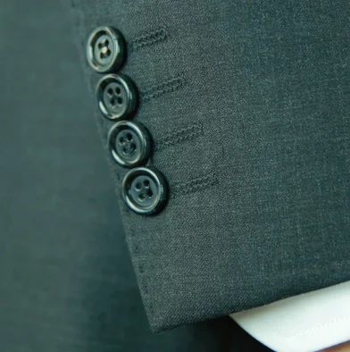 Small hand stitching on sleeve edge