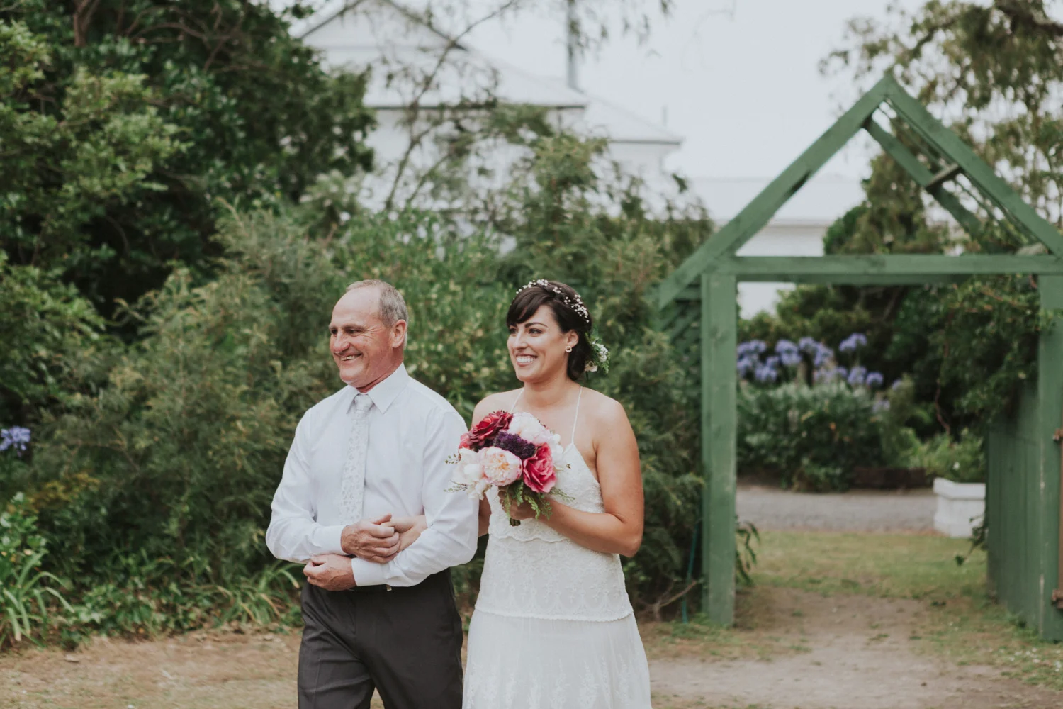 Father of the bride walkign down the isle