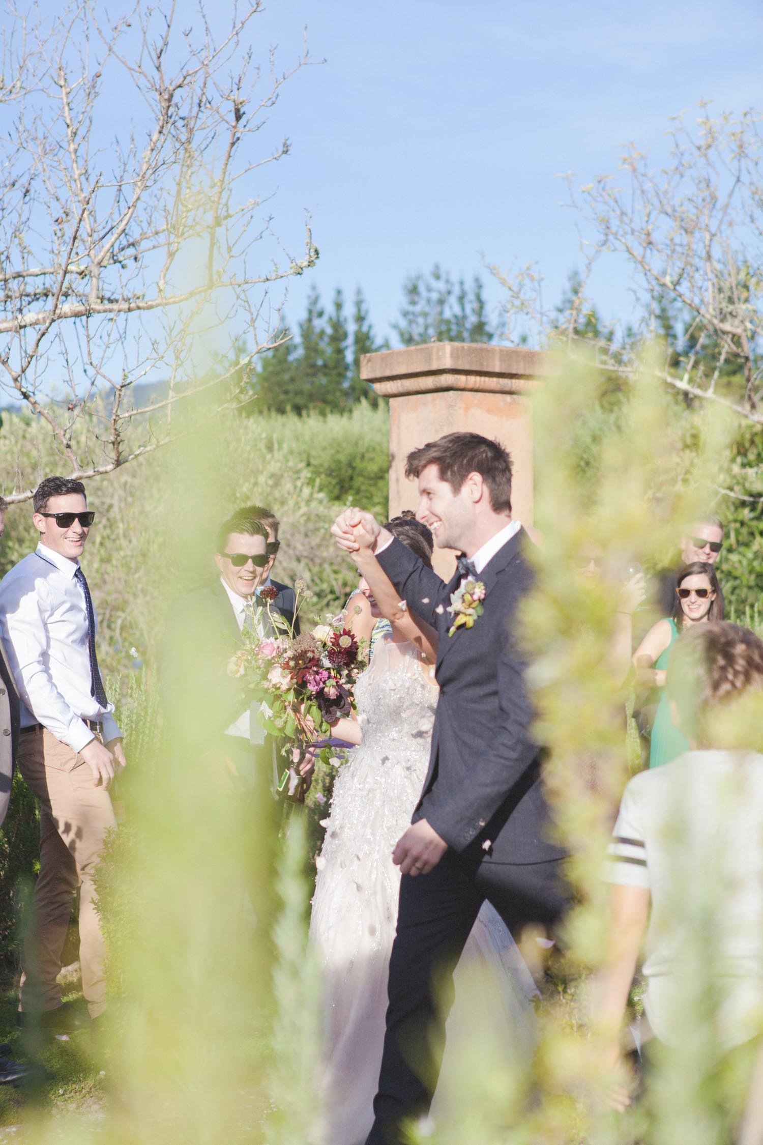 Bride and Groom walking down wedding aisle together after ceremony