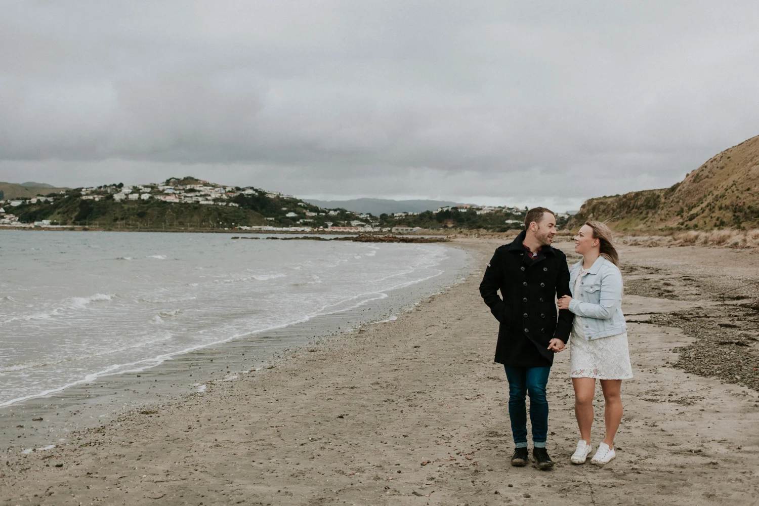 Couple walking along the beach