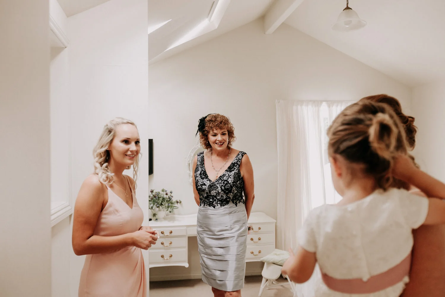 Mother seeing her daughter on wedding day