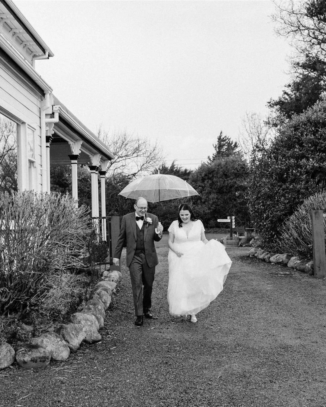 Once in a while we experience a rainy day wedding and when we do theres always something magic about how the photos turn out. 
⠀⠀⠀⠀⠀⠀⠀⠀⠀
I love this photo of the bridesmaids dancing in the rain while the bride and groom signed their marriage license 