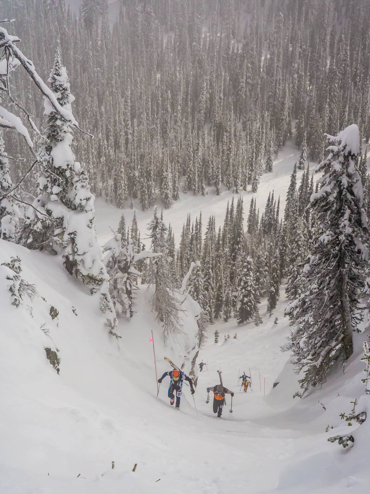 RIDGE coach, Ben Parsons, leading Mike Foote up The North Bowl Chute during the 2015 Whitefish Whiteout. 