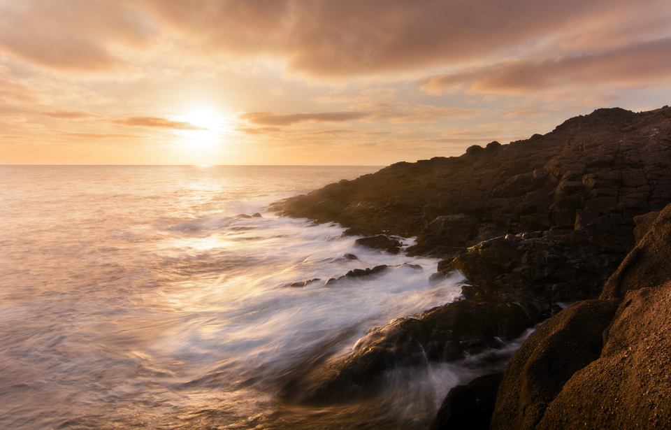 This image is a manual blend of two exposures. One for the sky and the other for the foreground. 