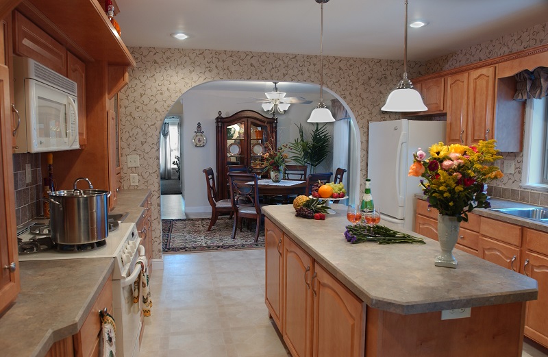 Pleasant Valley Homes Hearth Wall, Galley Kitchen With Island In Middle