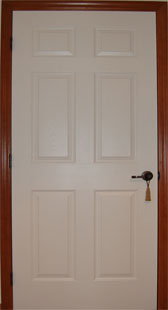 Opt. Cherry Stained Pine Trim Around White Door