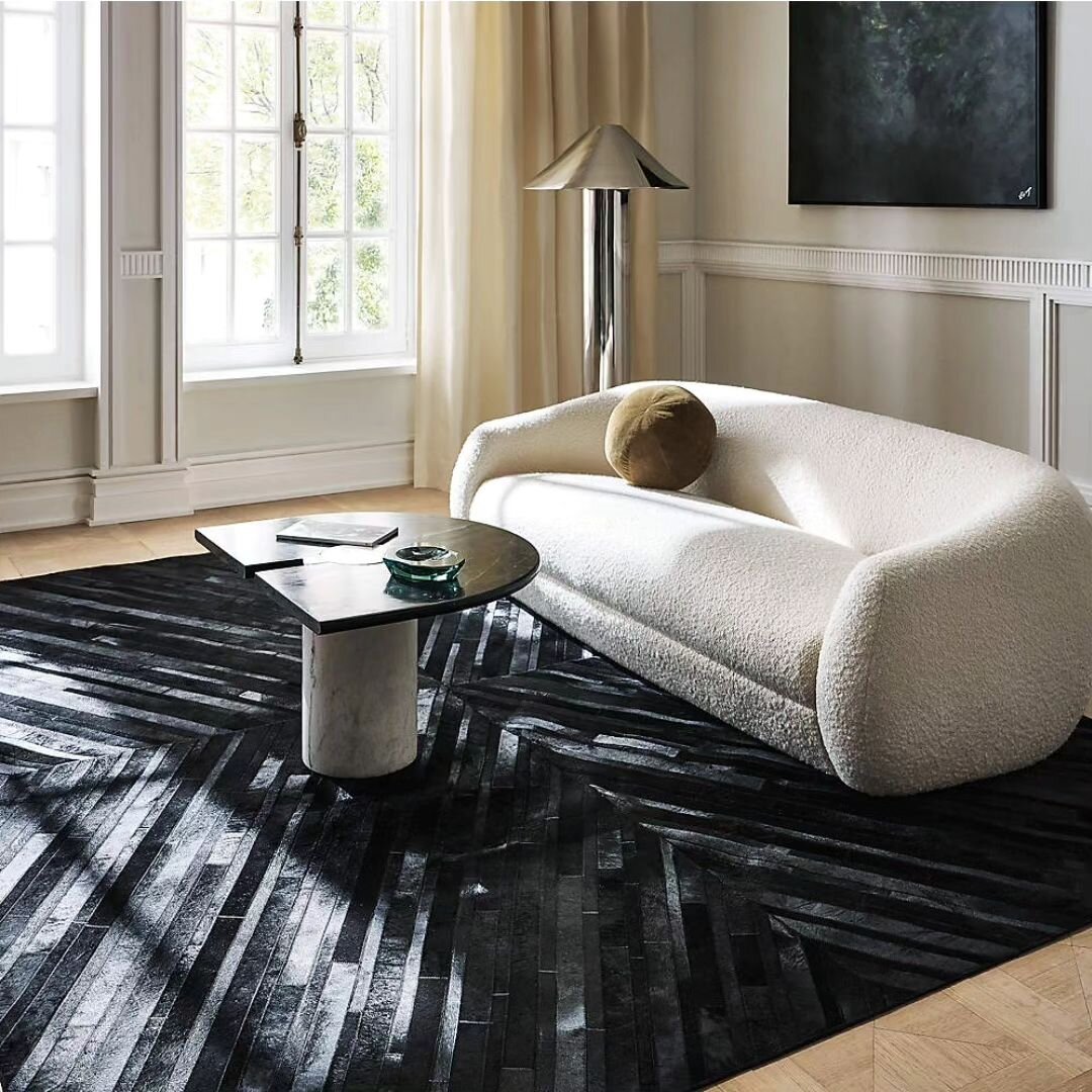And our second drop of the season: the Naho Black Hamwoven Hide Area Rug! Avaliable in multiple sizes. 
From @namavaridesigns for @cb2 

#namavari #printhappiness #arearug #interiordesign #textiledesign #abstractart #surfaceart #hiderug #cb2
Photo by