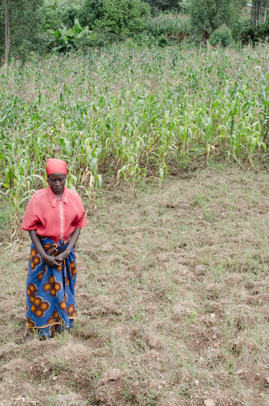  Raymond shows us her field with it's degraded soil 