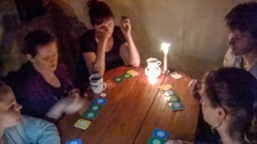  Playing games in Gitega by candlelight with our small circle of fellow foreigner friends 