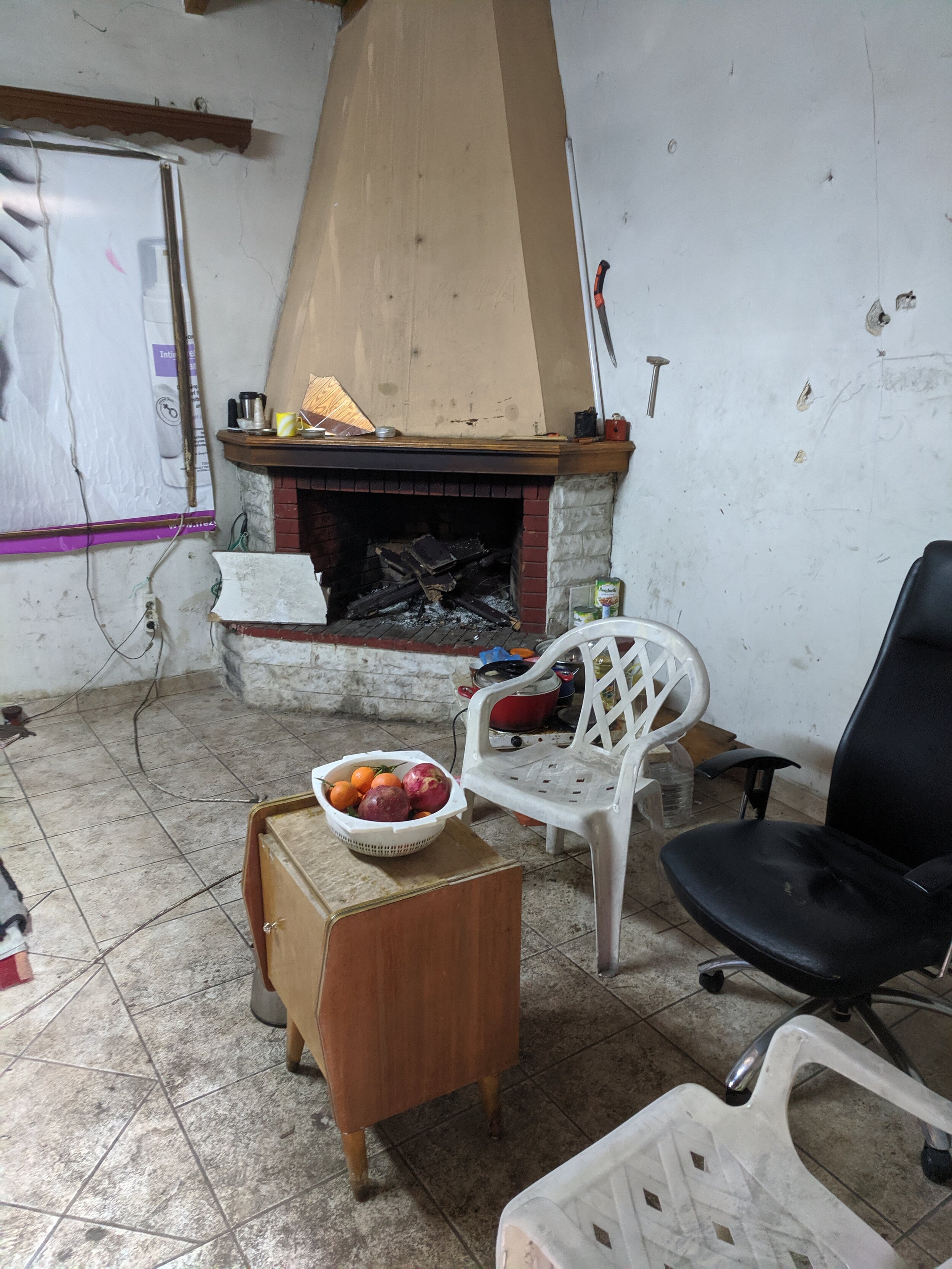 An abandoned building that houses around 8 refugees