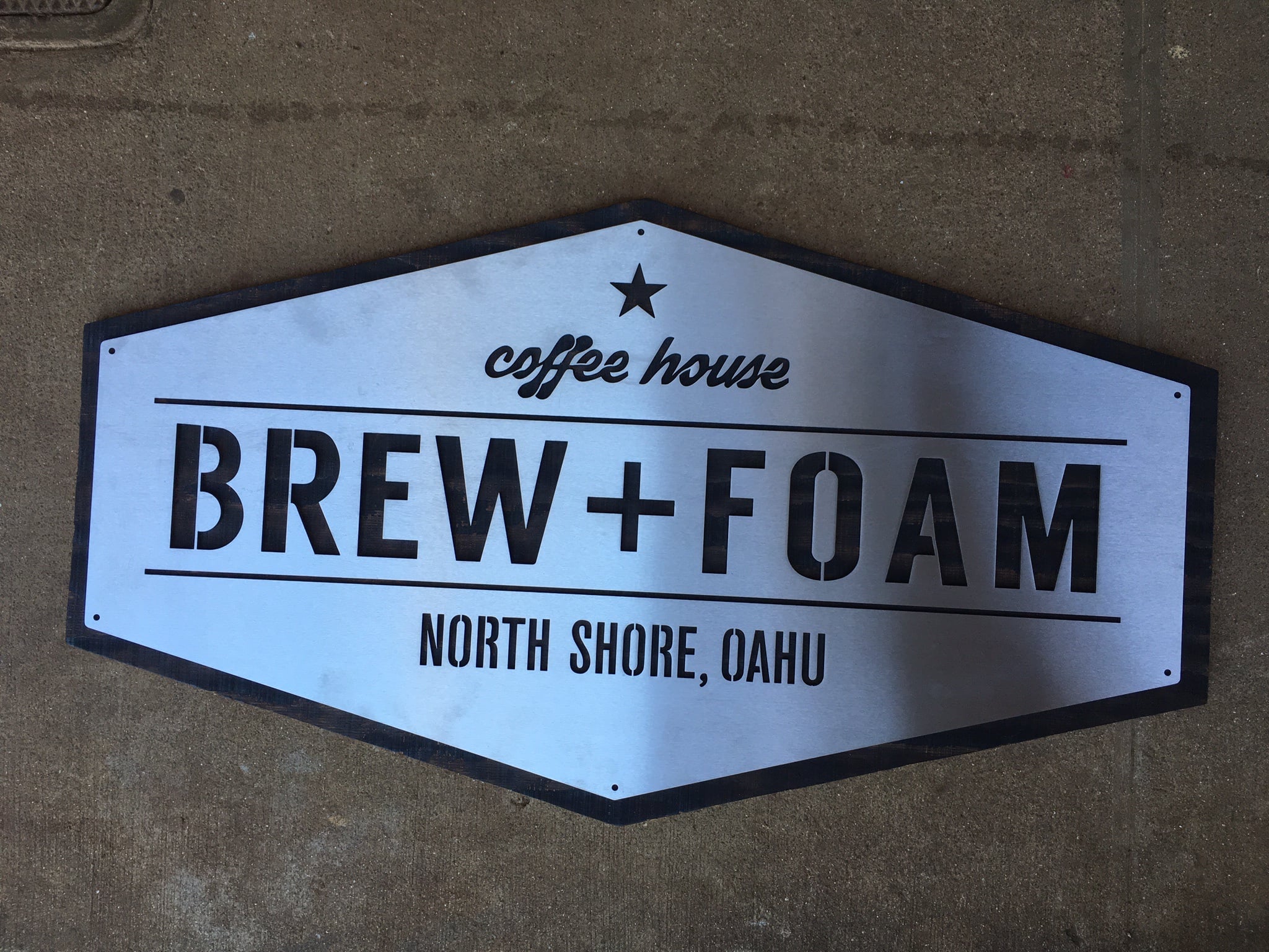 What's keeping us from hanging this on the wall, you ask? Truthfully this thing weighs a fricken ton! We just need some industrial screws to mount this behemoth machined of stainless and plywood...