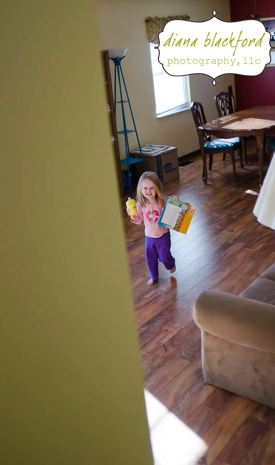 Getting ready for "nap time." She's pretty much given up naps, but doesn't complain about going in her room for some quiet time. We always start with a story.