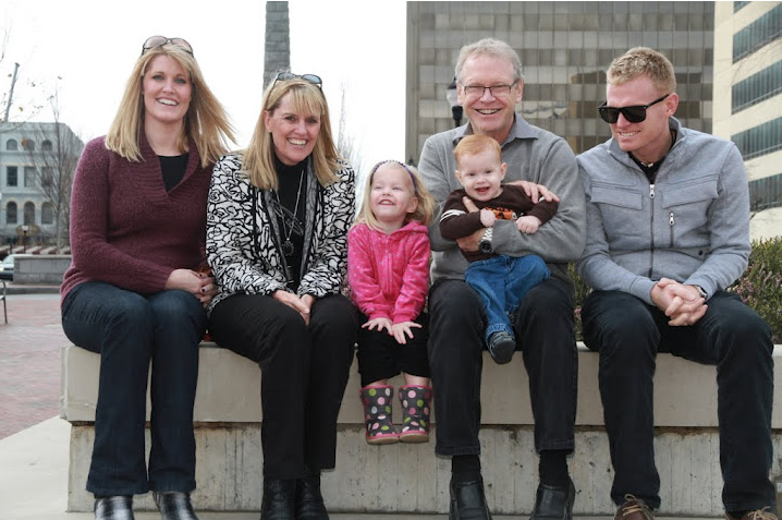 Happy times! Anna, Carol, Ava, Paul holding Tylan and Jay.
