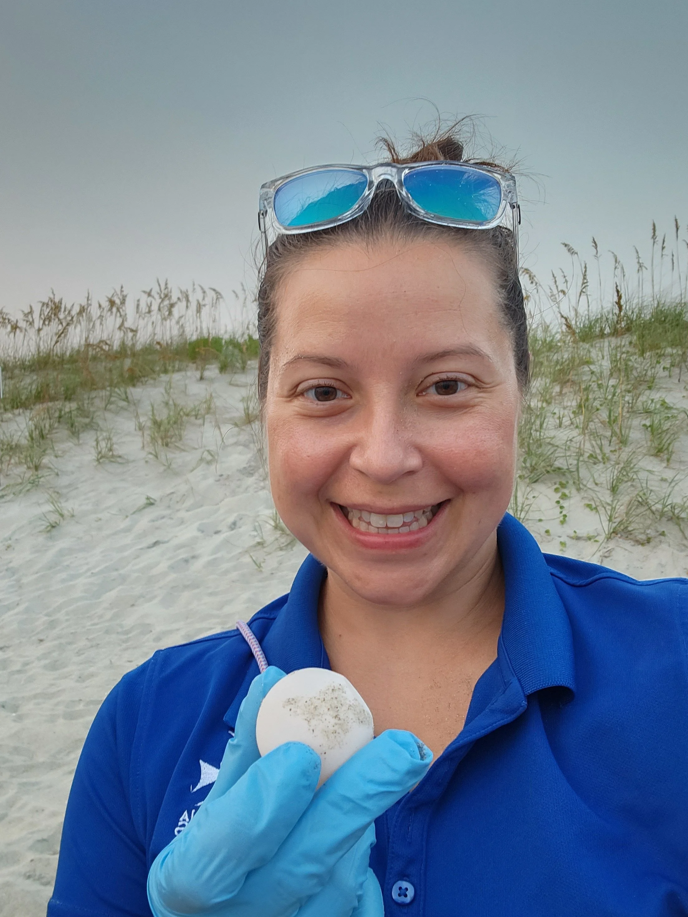 me holding sea turtle egg.jpg