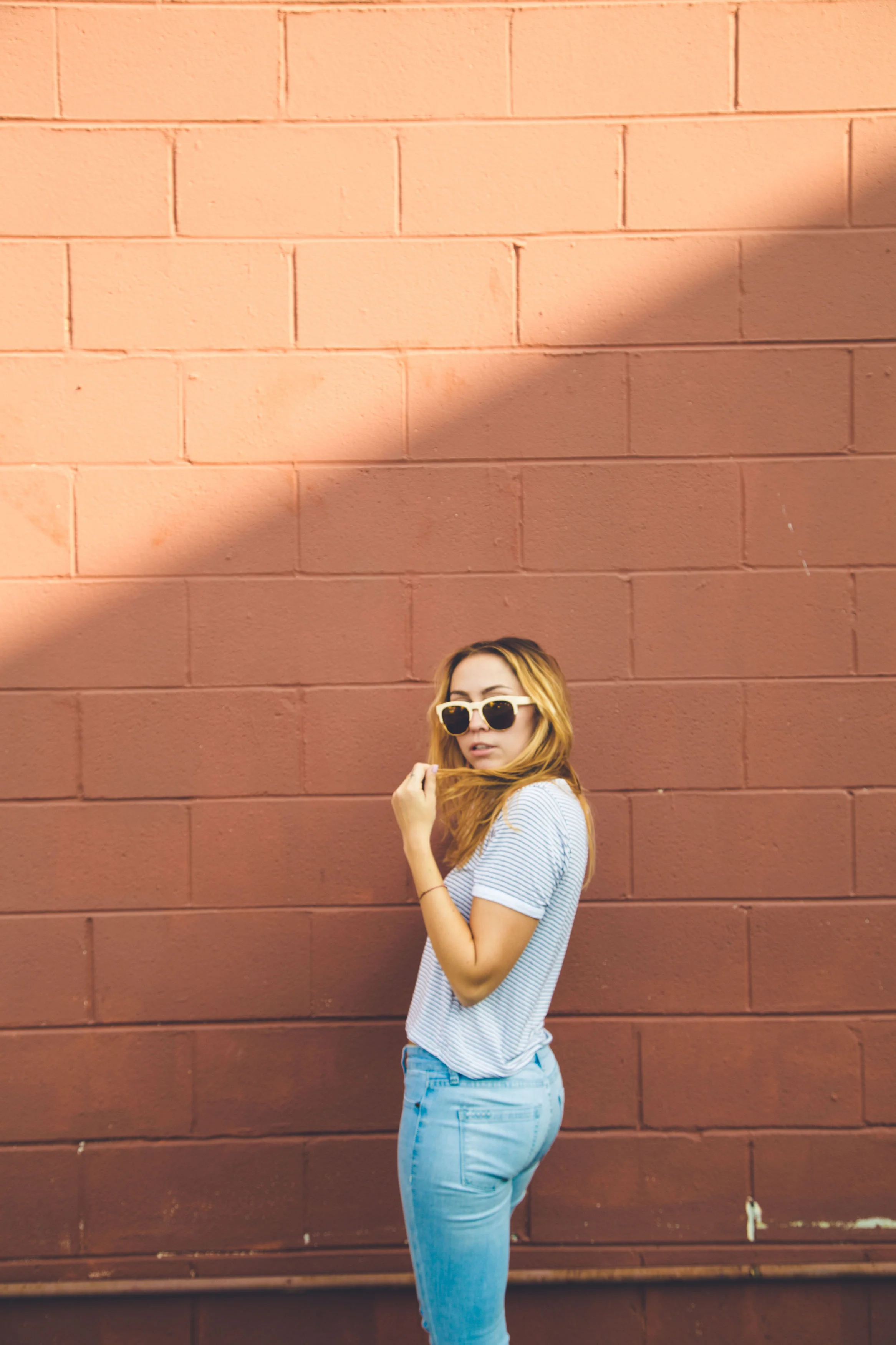 Shirt - Brandy Melville | Jeans - BlankNYC | Shades - Wildfox Sun | Sneaks - Saint Laurent || photos by Susannah Brittany
