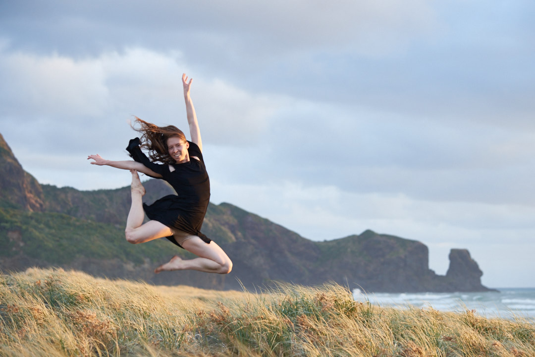 Amber and Rosie dance at Bethells Beach