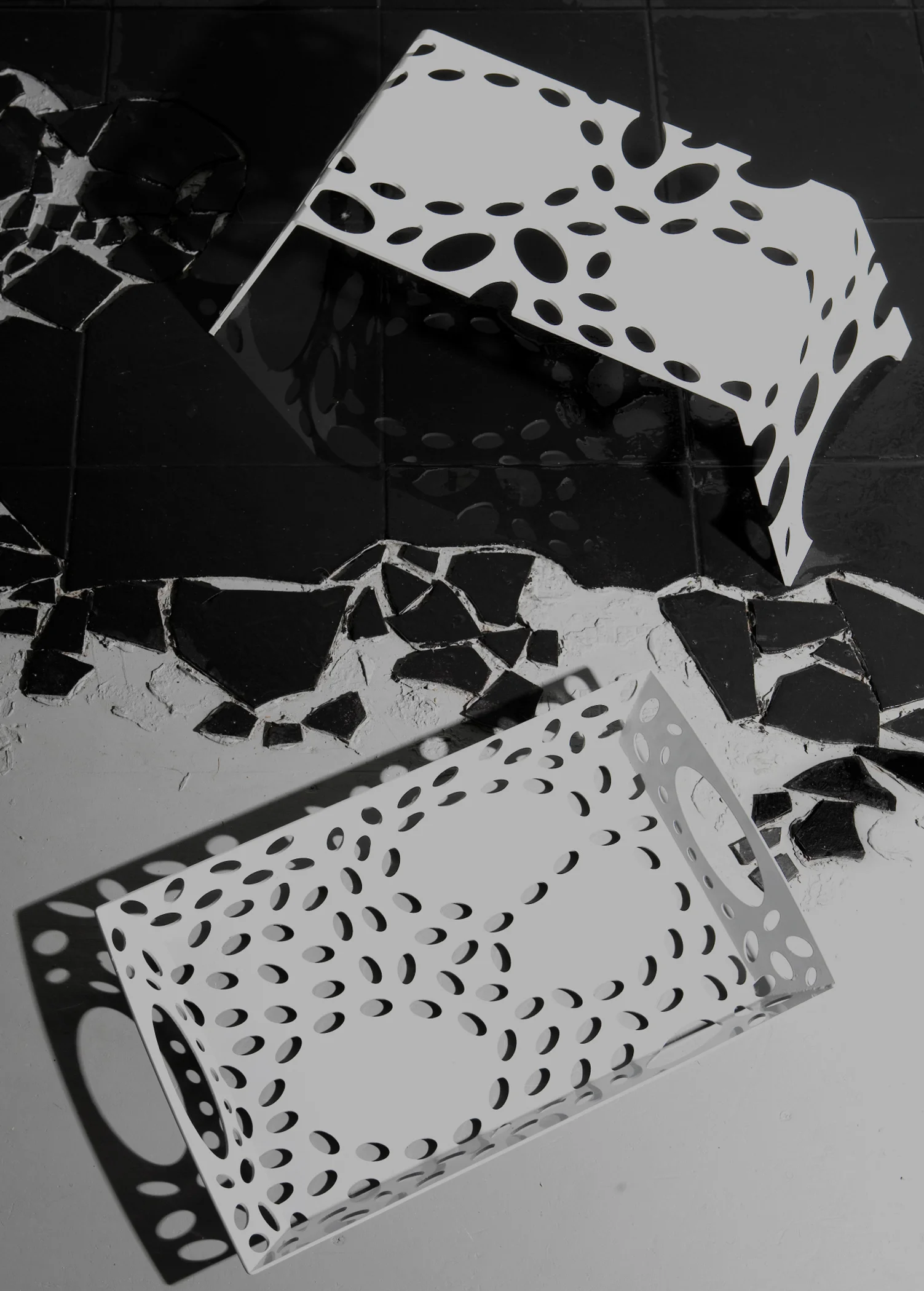 Mitosis Furniture are laser-cut, break-formed, welded and powder-coated steel pieces, which serve as studies of positive and negative space, as well as experimentations of light and shadow, while fusing both art and science. Photo by Lucas Collins.