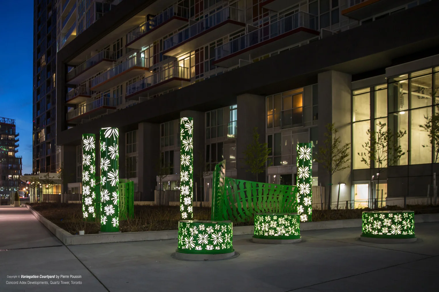Variegation Courtyard was inspired by local indigenous flowers and ferns, which once grew on in abundance in the area, and includes a series of laser-cut light columns, custom public seating, windscreens and featured wall flowers. Photos by Laura Rossi.