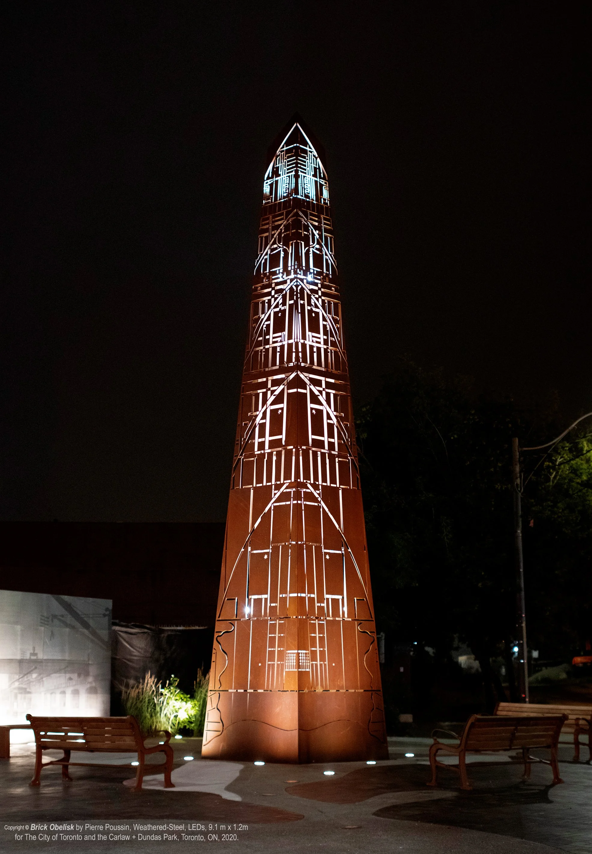 Brick Obelisk was created to help celebrate the City of Toronto’s Carlaw & Dundas neighborhood with its various documented historical stages, as an intricately patterned monument, crafted out of waterjet-cut Corten Steel with backlit LEDs. It