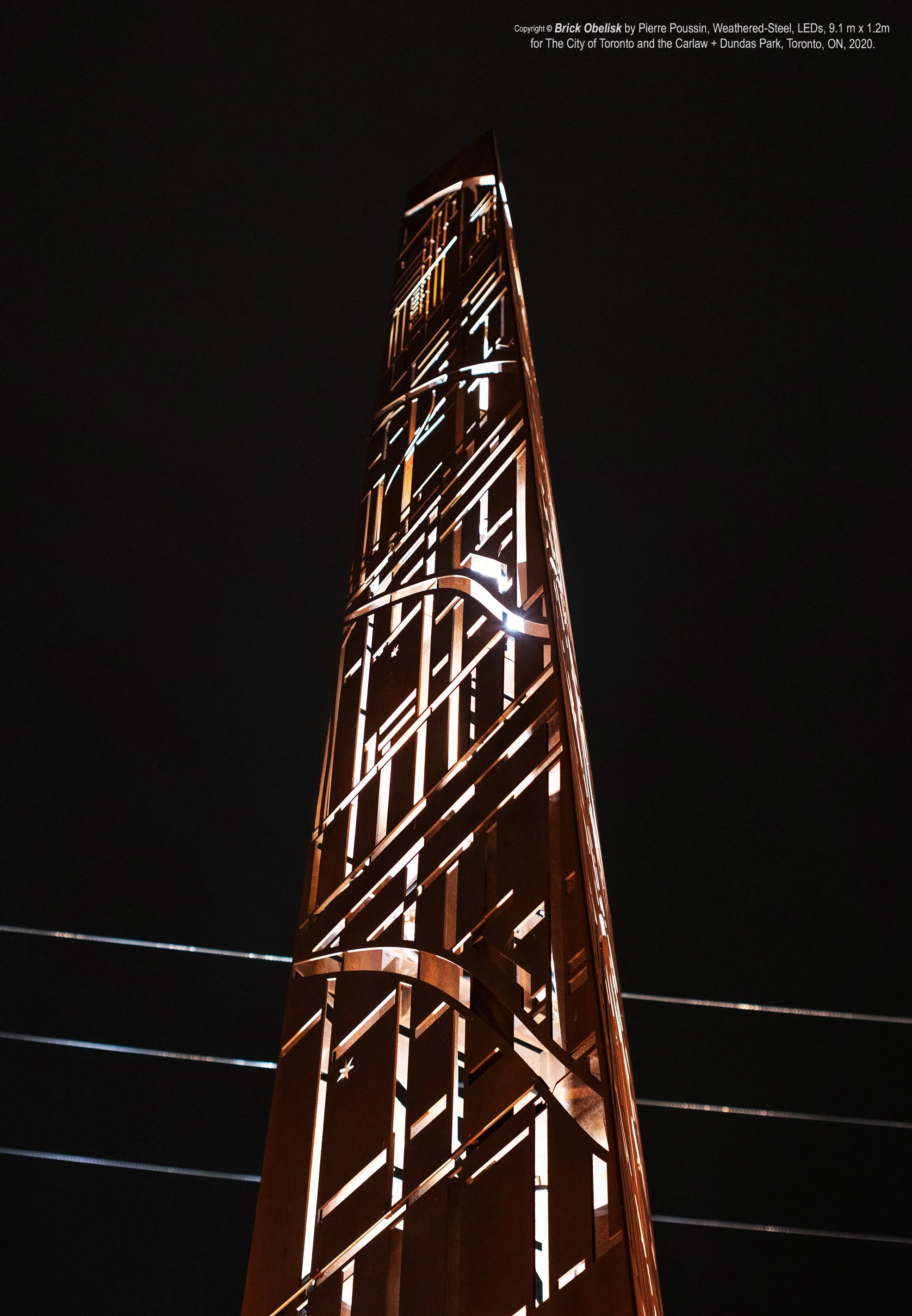 Brick Obelisk was created to help celebrate the City of Toronto’s Carlaw & Dundas neighborhood with its various documented historical stages, as an intricately patterned monument, crafted out of waterjet-cut Corten Steel with backlit LEDs. It