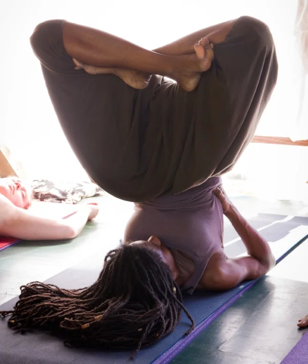 Jah9 rocking some yoga moves in her dropbottoms