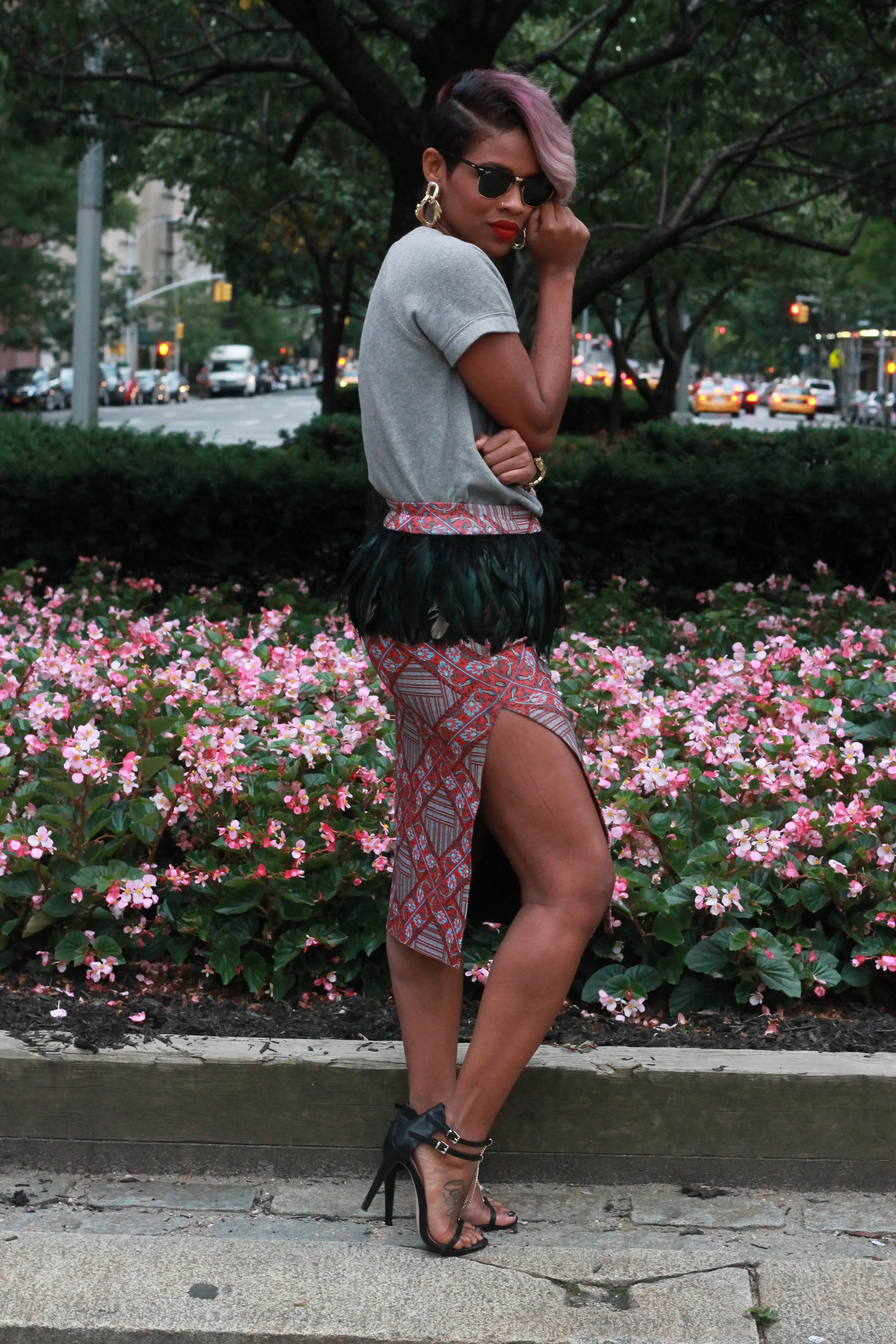 J Crew Sweatshirt, Something by Sonjia Skirt, ASOS Sandals, Rayban Sunglasses, Michael Kors Watch, Thrifted Earrings, and Sephora Lipstick.&nbsp;