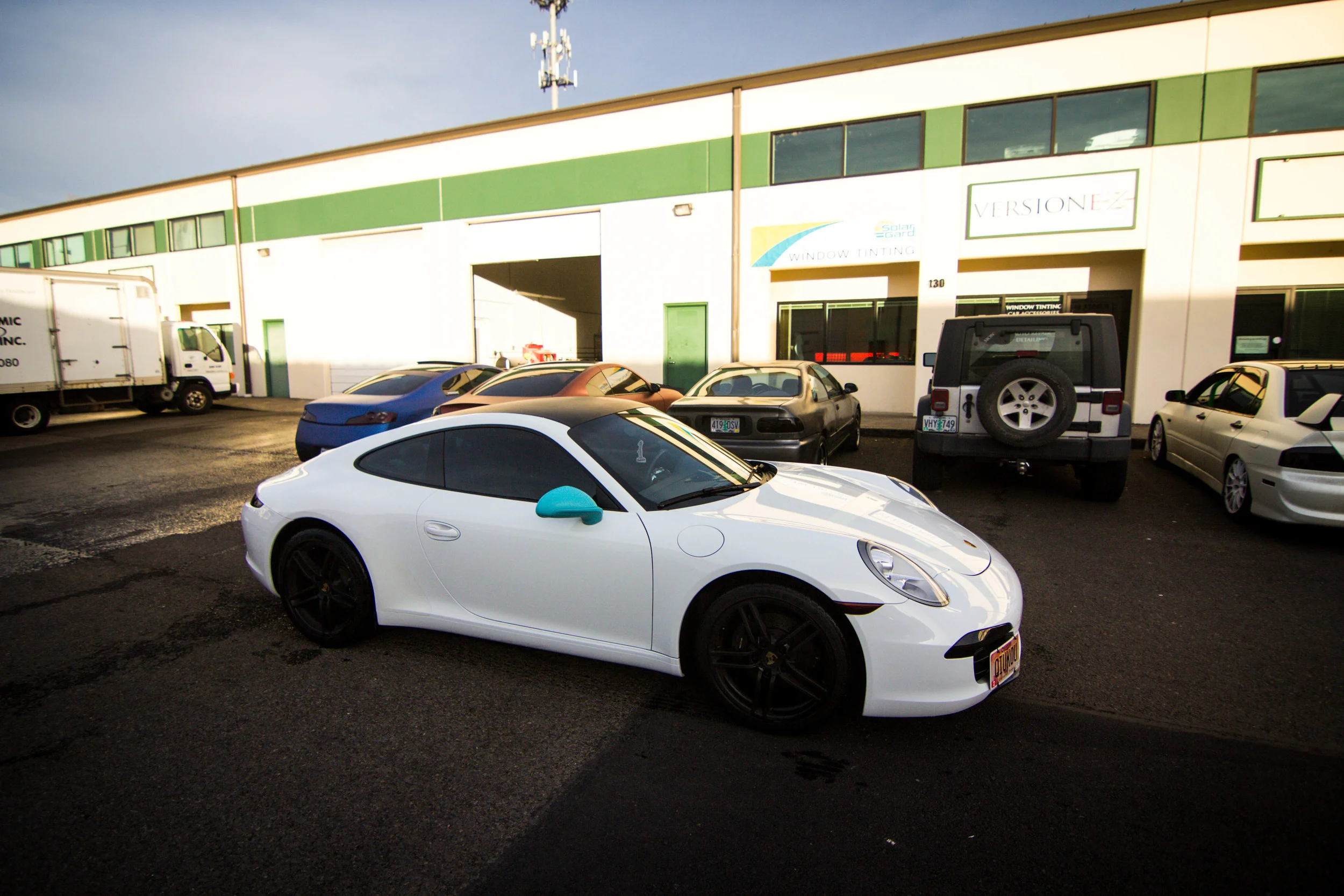 Porsche came in to protect their interior, so they got their windows tinted! Window Tint: 20% all around