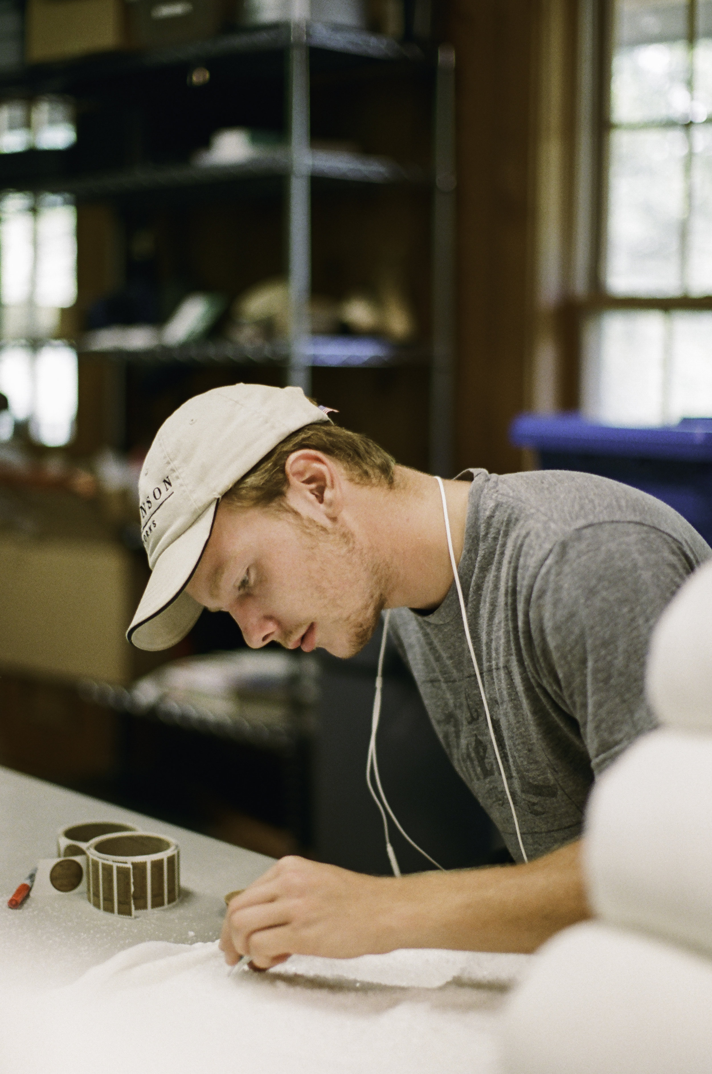  Sam cleans each batch of salt with tweezers. &nbsp;Each batch is double checked before packaging. "Working here has made me realize that it’s enjoyable to put time into food opposed to just running through somewhere and picking up food.” 