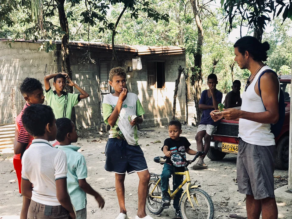 Alejandro is teaching the children how to treat animals with respect and love