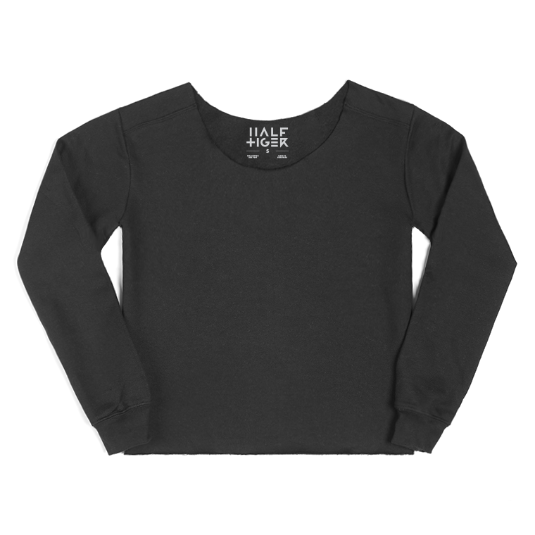 Half Tiger Cut & Croppped Crew Neck Sweater This oversized women's sweatshirt has been hand cut for a unique, relaxed look. The raw edge finish along the neckline and cropped hem adds even more character to this new look on a trusted staple. Available in Navy, Black, and Heather Grey.