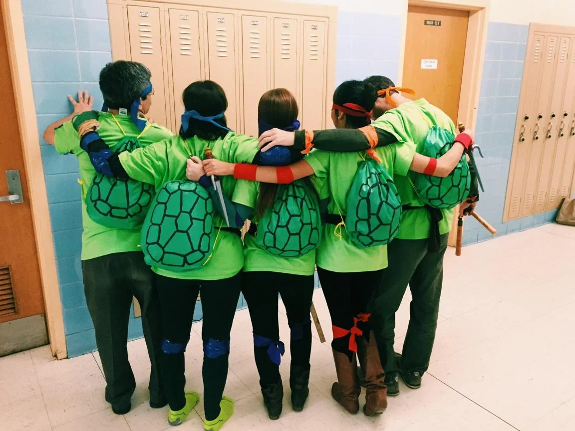 Some of my amazingly awesome coworkers in their TMNT costumes for Halloween! Hand-painted turtle-shell backpacks, and all! 