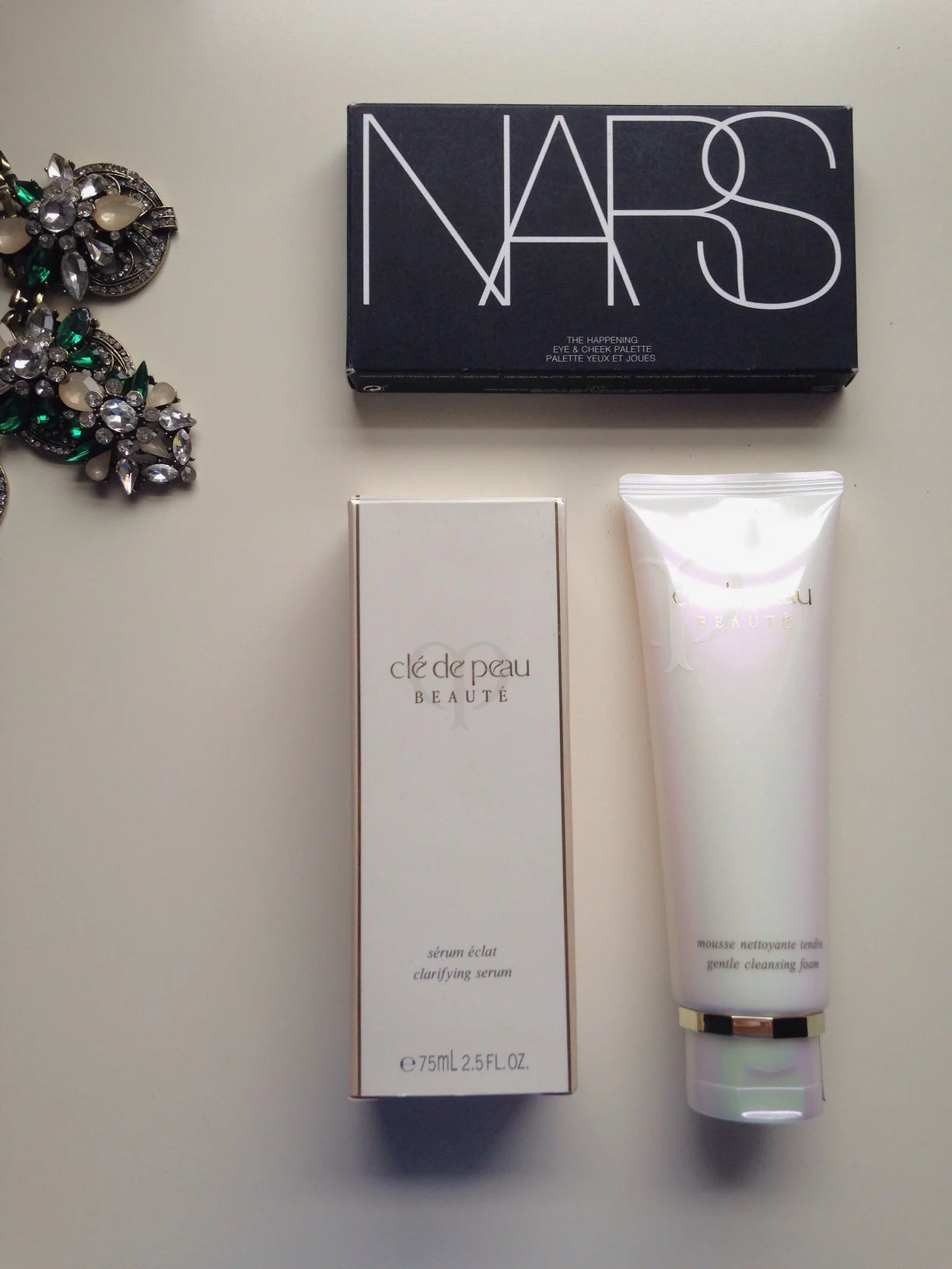 NARS The Happening Palette; Cle de Peau Clarifying Serum; Cle de Peau Gentle Cleansing Foam