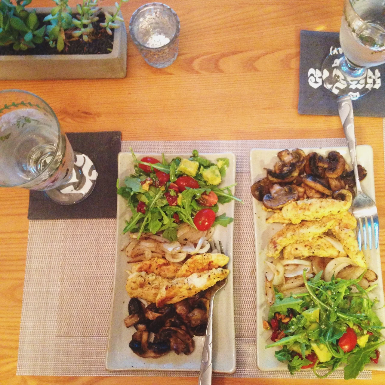 A more elaborate dinner: Mustard-marinated chicken, grilled onions and mushrooms, arugula salad with tomatoes and avocado