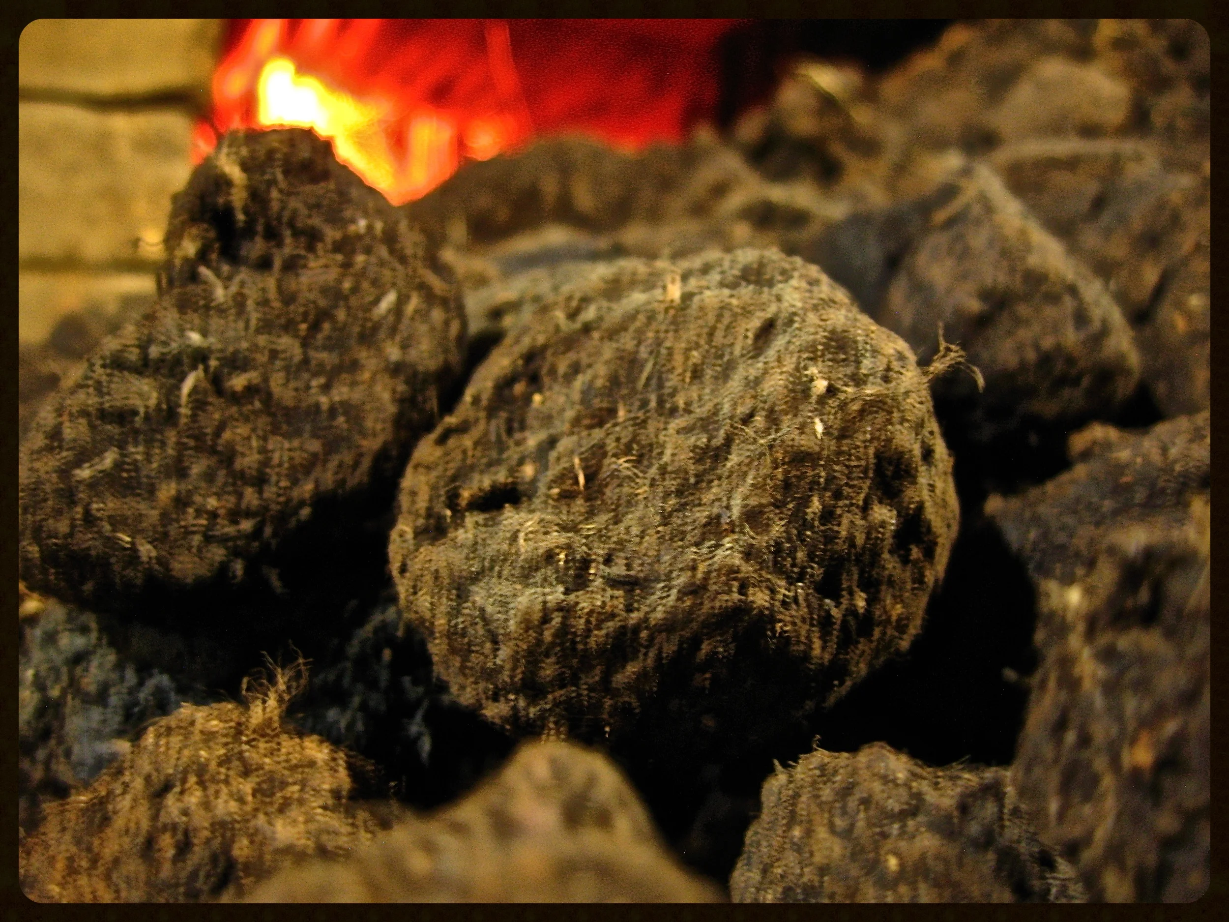 Dried peat going into the kiln.