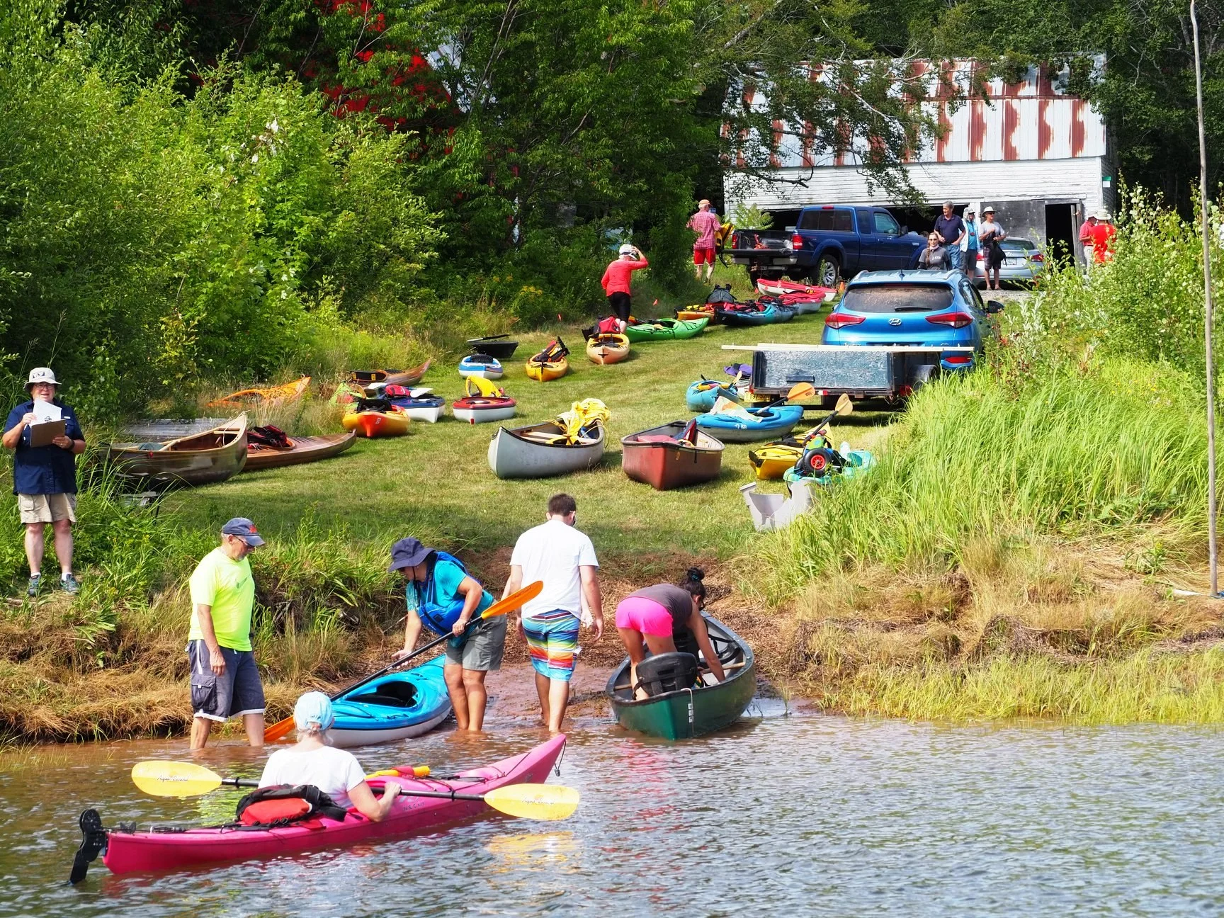 Clara checks us in and we are helped out of our kayaks. Thanks, Mike. That part gets more important every year.
