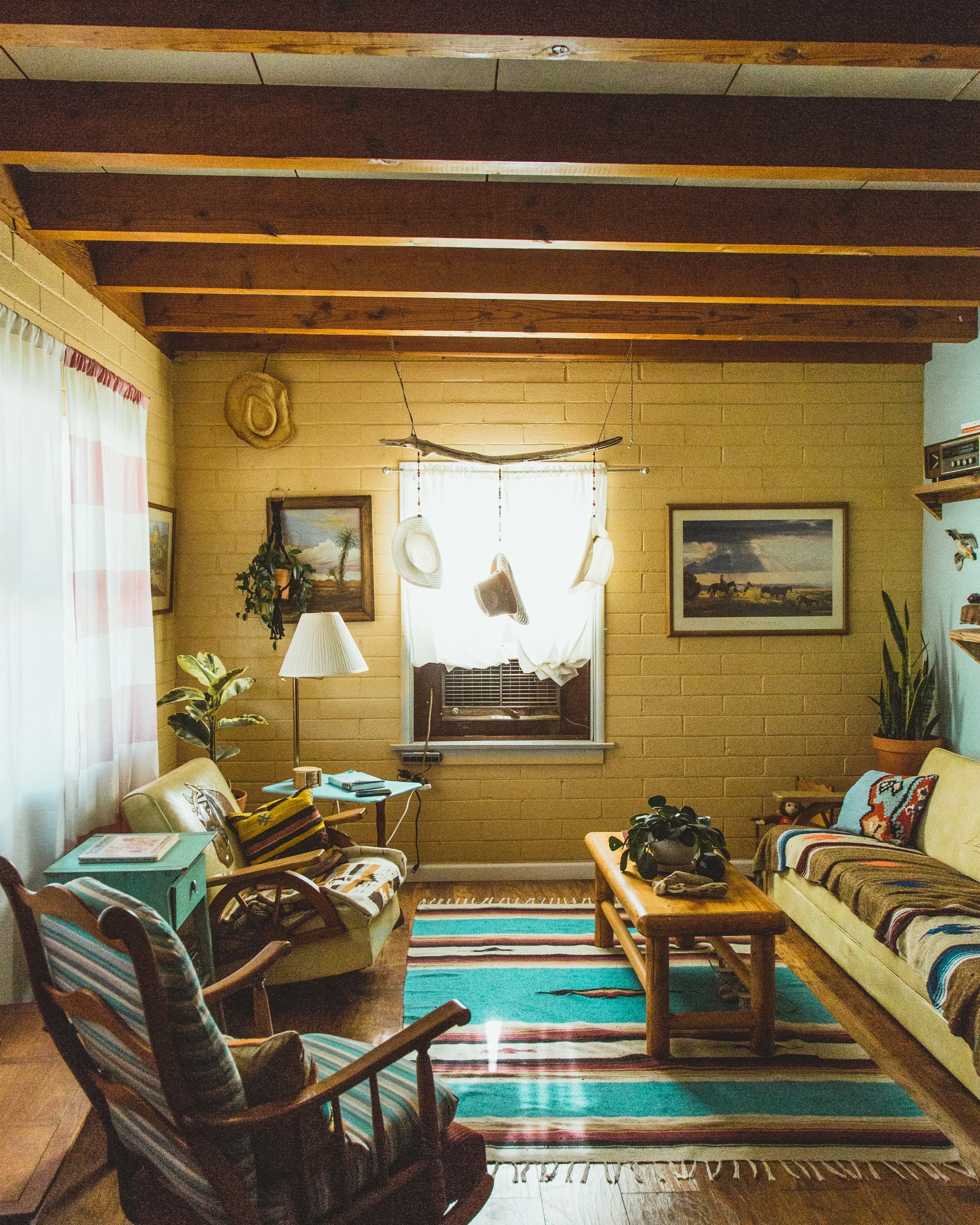 You've gotta love a beach boho / desert vibe! This space has stuck to one style and does it well.